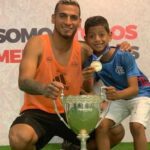 Miguel Trauco With His Son